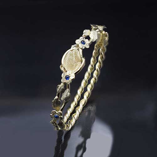 Gouden armband met vingerafdruk en bloemen, herinneringssieraad